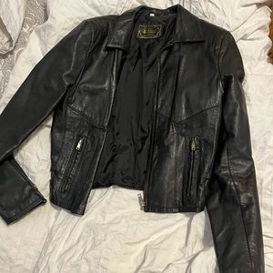 Real leather jacket. It fits more than a medium size. Really good condition!
